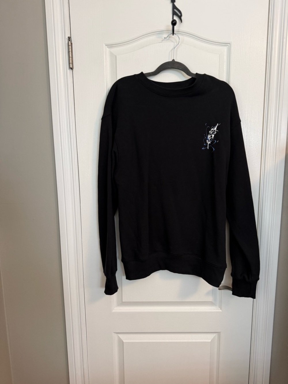 BTS Black Crewneck Sweatshirt with Subtle Embroidered Accent